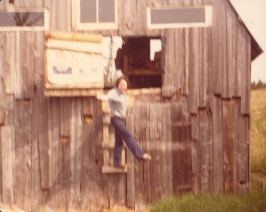 198005xx-ra-002-Wolf At Barn-Randboro